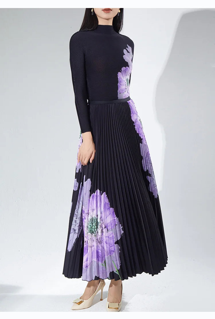 A complete outfit for women, including a long-sleeved t-shirt and a printed pleated skirt – a two-piece set.