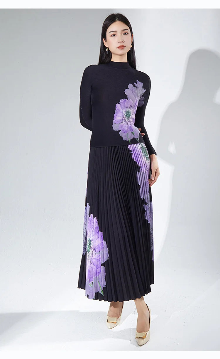 A complete outfit for women, including a long-sleeved t-shirt and a printed pleated skirt – a two-piece set.