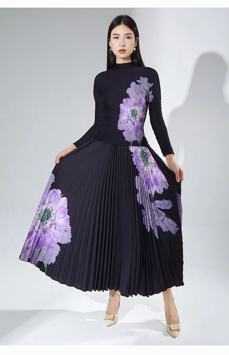 A complete outfit for women, including a long-sleeved t-shirt and a printed pleated skirt – a two-piece set.