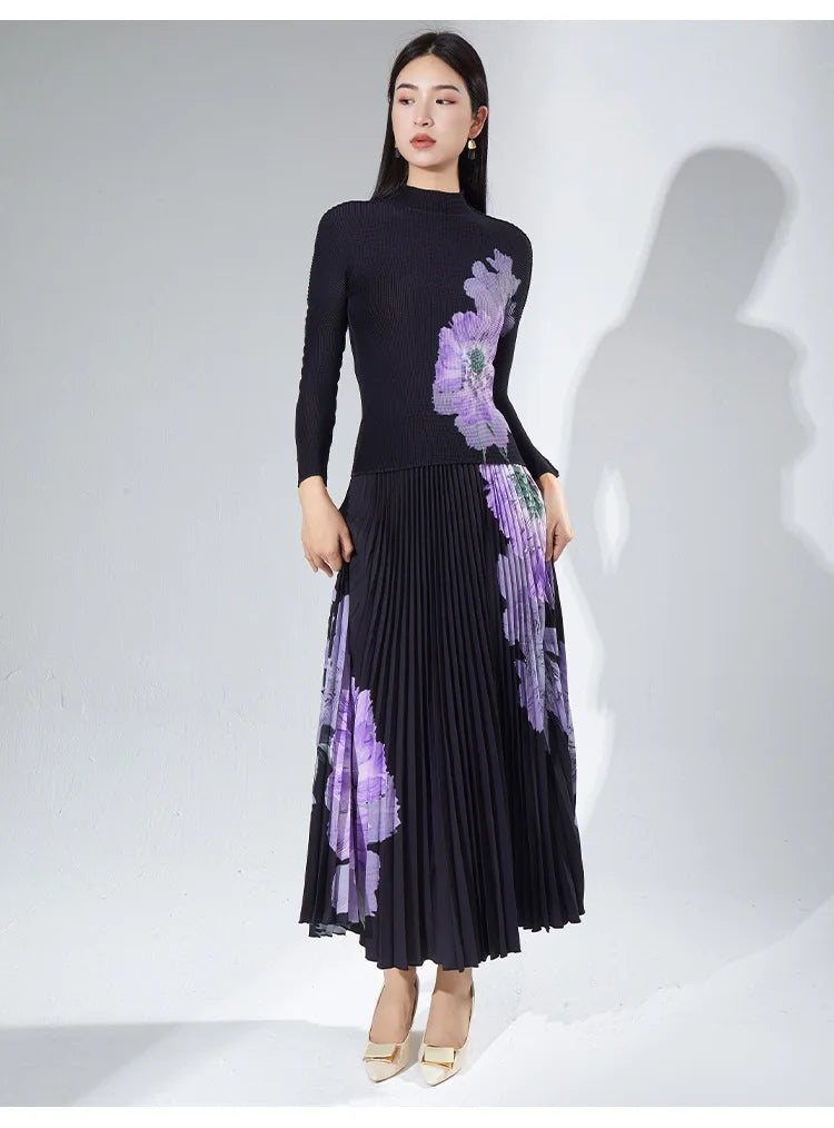 A complete outfit for women, including a long-sleeved t-shirt and a printed pleated skirt – a two-piece set.